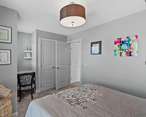 6 Ravenswynd Rise Se, Airdrie, AB - Indoor Photo Showing Bedroom