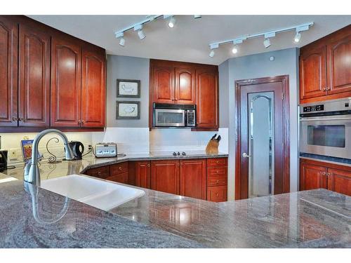 704-837 2 Avenue Sw, Calgary, AB - Indoor Photo Showing Kitchen With Double Sink