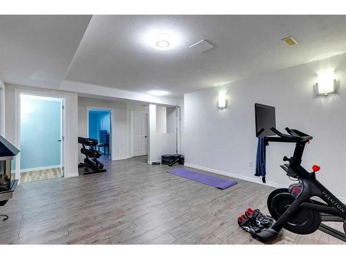 203 Bishop Mews Nw, Langdon, AB - Indoor Photo Showing Gym Room