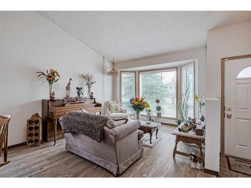 68 Woodford Close Sw, Calgary, AB - Indoor Photo Showing Living Room