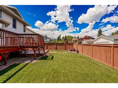 68 Woodford Close Sw, Calgary, AB - Outdoor With Deck Patio Veranda