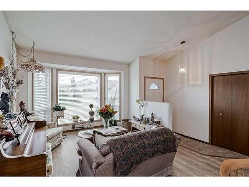 68 Woodford Close Sw, Calgary, AB - Indoor Photo Showing Living Room