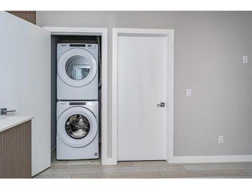 1218-681 Savanna Boulevard Ne, Calgary, AB - Indoor Photo Showing Laundry Room