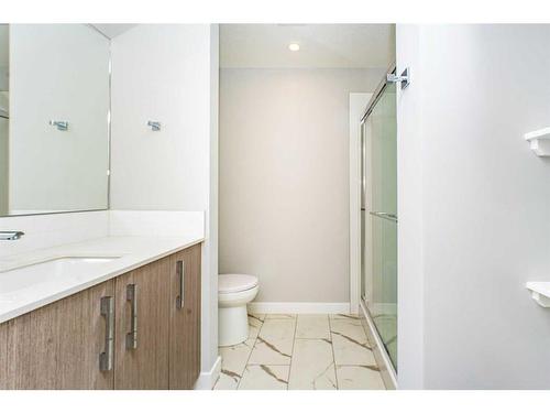 1218-681 Savanna Boulevard Ne, Calgary, AB - Indoor Photo Showing Bathroom