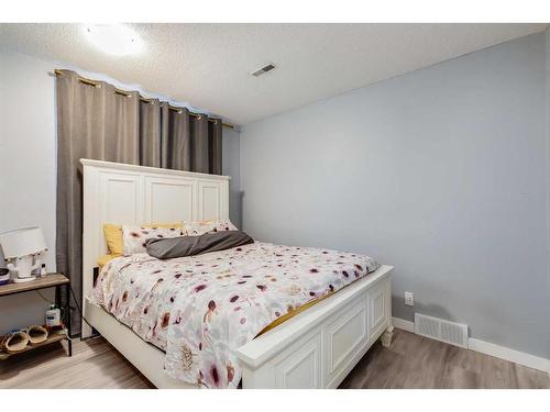 120 Oaktree Close Sw, Calgary, AB - Indoor Photo Showing Bedroom