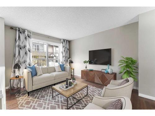 181 New Brighton Villas Se, Calgary, AB - Indoor Photo Showing Living Room