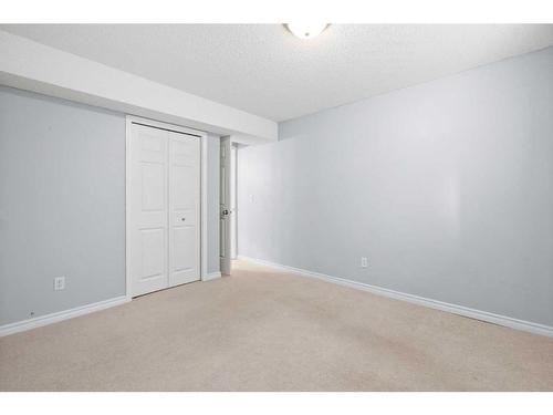 220 Chapala Drive Se, Calgary, AB - Indoor Photo Showing Other Room