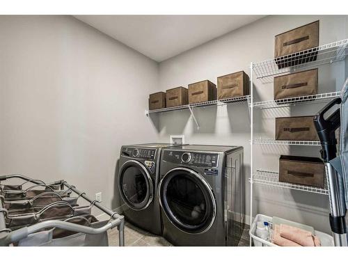 44 Heritage Court, Cochrane, AB - Indoor Photo Showing Laundry Room