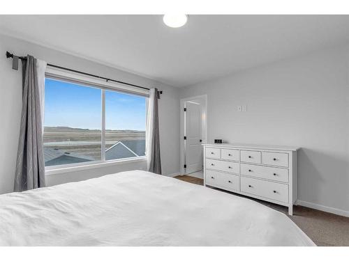 310 Belmont Heath Sw, Calgary, AB - Indoor Photo Showing Bedroom