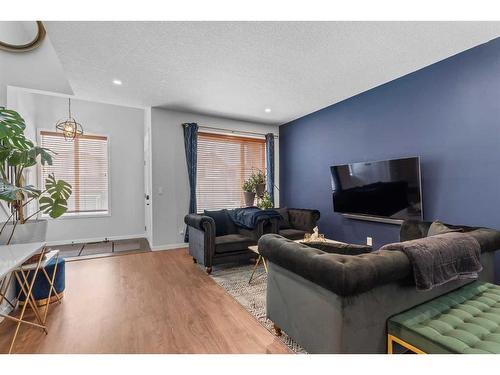 310 Belmont Heath Sw, Calgary, AB - Indoor Photo Showing Living Room
