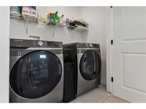 301 Sundown Road, Cochrane, AB - Indoor Photo Showing Laundry Room
