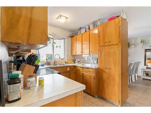 55 Coleridge Crescent Nw, Calgary, AB - Indoor Photo Showing Kitchen With Double Sink