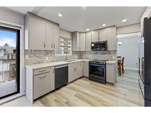144 Whitlow Place Ne, Calgary, AB - Indoor Photo Showing Kitchen With Upgraded Kitchen