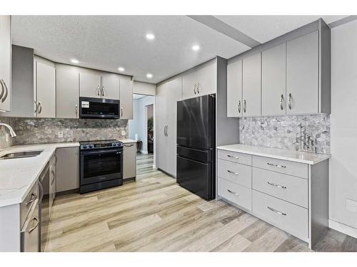 144 Whitlow Place Ne, Calgary, AB - Indoor Photo Showing Kitchen With Upgraded Kitchen