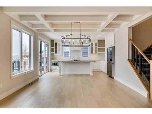 1512 Coopers Point Sw, Airdrie, AB - Indoor Photo Showing Kitchen