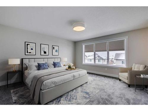 1512 Coopers Point Sw, Airdrie, AB - Indoor Photo Showing Bedroom