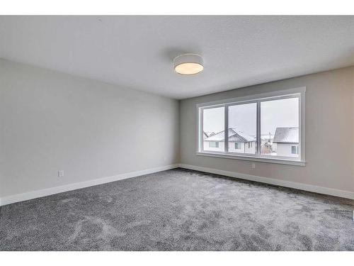 1512 Coopers Point Sw, Airdrie, AB - Indoor Photo Showing Other Room