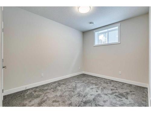 1512 Coopers Point Sw, Airdrie, AB - Indoor Photo Showing Other Room
