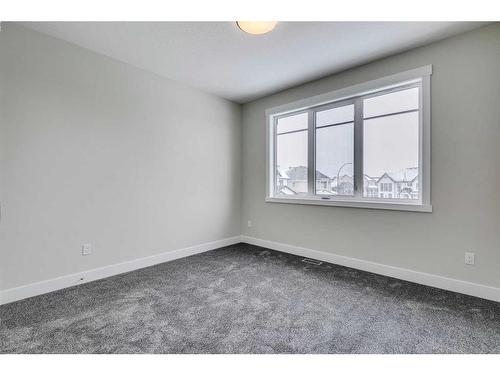 1512 Coopers Point Sw, Airdrie, AB - Indoor Photo Showing Other Room