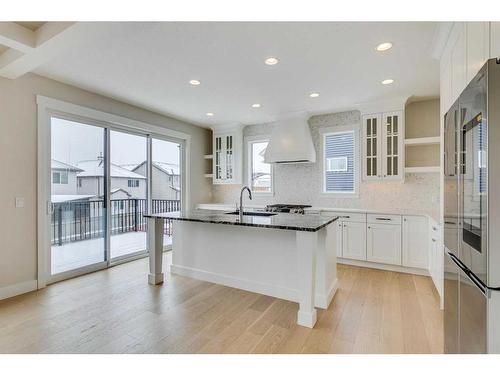 1512 Coopers Point Sw, Airdrie, AB - Indoor Photo Showing Kitchen With Upgraded Kitchen