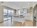 1512 Coopers Point Sw, Airdrie, AB  - Indoor Photo Showing Kitchen With Upgraded Kitchen 