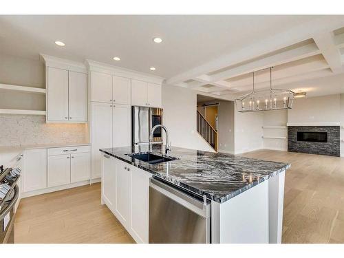 1512 Coopers Point Sw, Airdrie, AB - Indoor Photo Showing Kitchen With Double Sink With Upgraded Kitchen