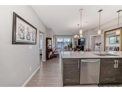 605-122 Mahogany Centre Se, Calgary, AB - Indoor Photo Showing Kitchen With Double Sink With Upgraded Kitchen