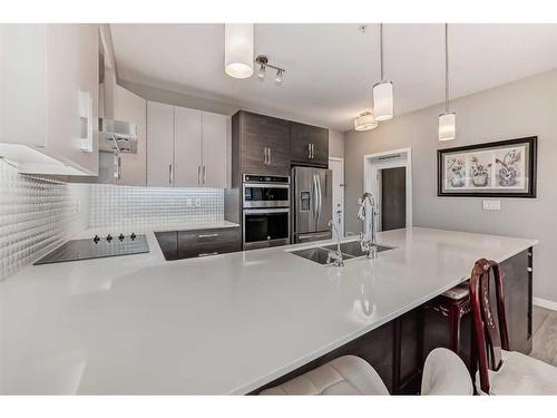 605-122 Mahogany Centre Se, Calgary, AB - Indoor Photo Showing Kitchen With Stainless Steel Kitchen With Double Sink With Upgraded Kitchen