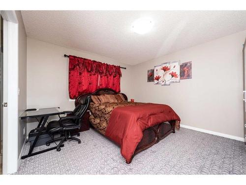 75 Saddlebrook Gardens Ne, Calgary, AB - Indoor Photo Showing Bedroom