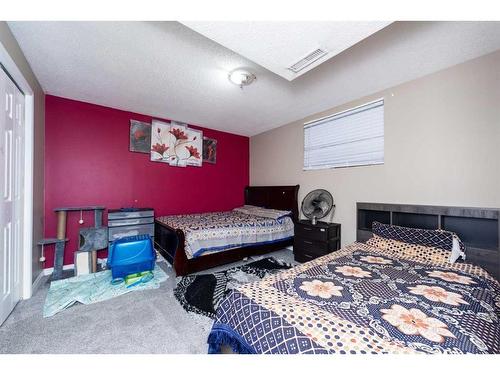 75 Saddlebrook Gardens Ne, Calgary, AB - Indoor Photo Showing Bedroom