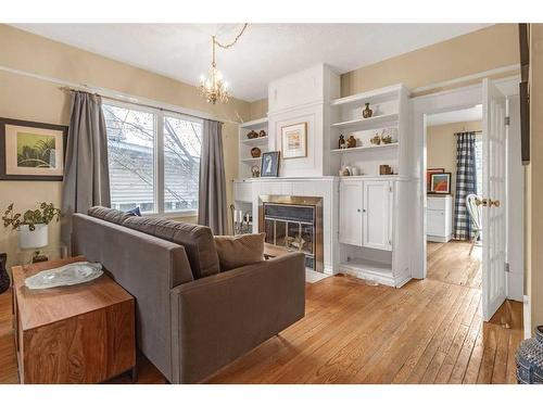 3715 14A Street Sw, Calgary, AB - Indoor Photo Showing Living Room With Fireplace