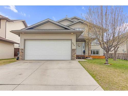 256 Sunset Heights, Crossfield, AB - Outdoor With Facade