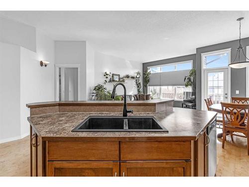 256 Sunset Heights, Crossfield, AB - Indoor Photo Showing Kitchen With Double Sink