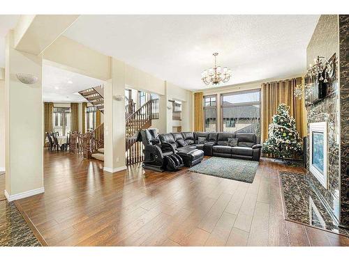5 Elveden Point Sw, Calgary, AB - Indoor Photo Showing Living Room With Fireplace