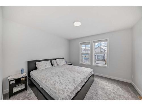 44 Heirloom Crescent Se, Calgary, AB - Indoor Photo Showing Bedroom