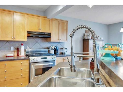 176 Royal Oak Heights Nw, Calgary, AB - Indoor Photo Showing Kitchen With Double Sink
