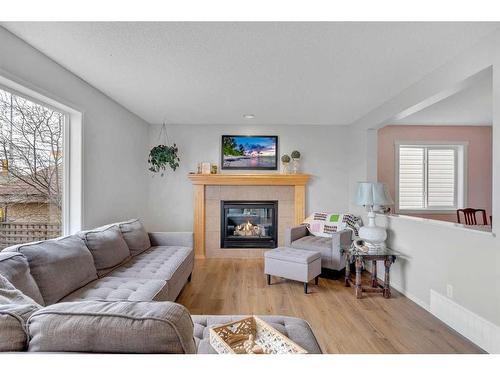 176 Royal Oak Heights Nw, Calgary, AB - Indoor Photo Showing Living Room With Fireplace