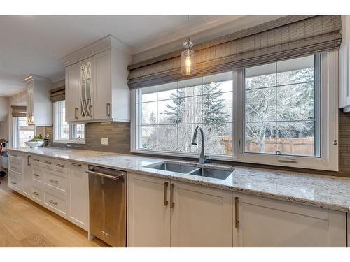 1428 Chardie Place Sw, Calgary, AB - Indoor Photo Showing Kitchen With Double Sink