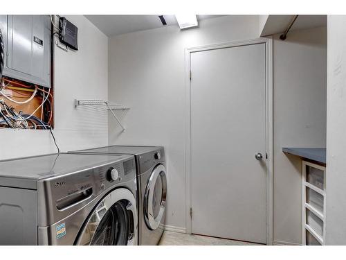 1428 Chardie Place Sw, Calgary, AB - Indoor Photo Showing Laundry Room