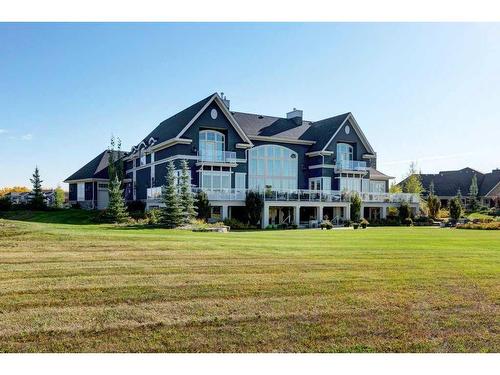 9 Swift Creek Green, Rural Rocky View County, AB - Outdoor With Deck Patio Veranda With Facade