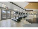 5302-11811 Lake Fraser Drive Se, Calgary, AB  - Indoor Photo Showing Gym Room 