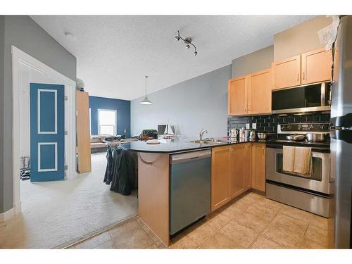 5302-11811 Lake Fraser Drive Se, Calgary, AB - Indoor Photo Showing Kitchen With Stainless Steel Kitchen
