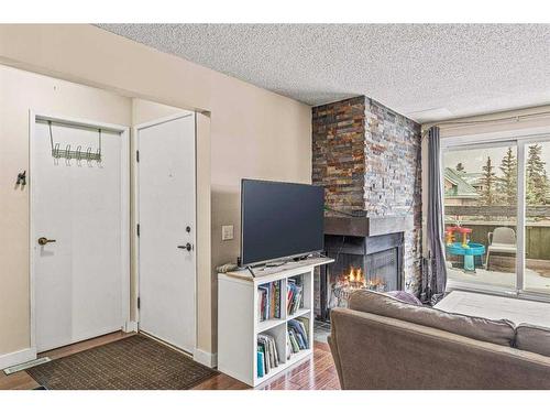 102-436 Banff Avenue, Banff, AB - Indoor With Fireplace
