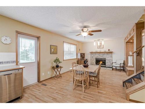 105 Arbour Ridge Circle Nw, Calgary, AB - Indoor With Fireplace