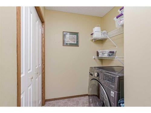 105 Arbour Ridge Circle Nw, Calgary, AB - Indoor Photo Showing Laundry Room