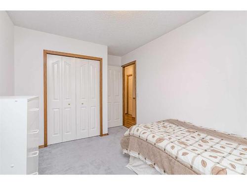 105 Arbour Ridge Circle Nw, Calgary, AB - Indoor Photo Showing Bedroom