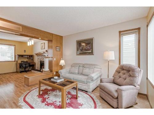 105 Arbour Ridge Circle Nw, Calgary, AB - Indoor Photo Showing Living Room