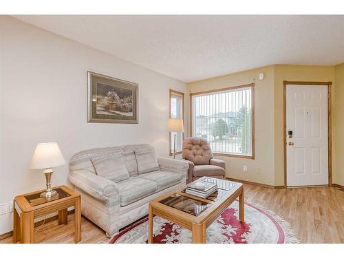 105 Arbour Ridge Circle Nw, Calgary, AB - Indoor Photo Showing Living Room