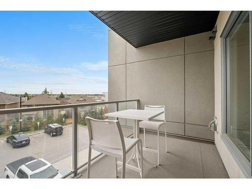 209-71 Shawnee Common Sw, Calgary, AB - Outdoor With Balcony With Exterior