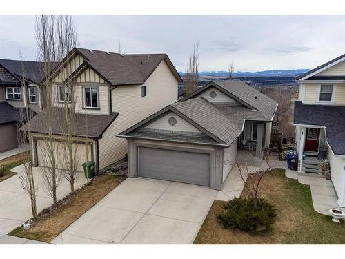 221 Sunset Heights, Cochrane, AB - Outdoor With Facade